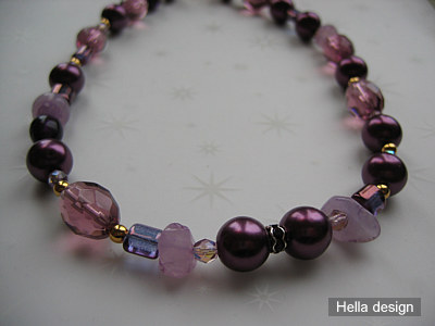 Lila halsband med guldl�s