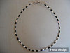 Halsband i grön/brun metallic och silverstavar